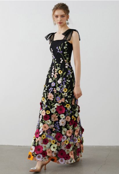 فستان ماكسي من التول الشبكي مزين بالزهور ثلاثي الأبعاد باللون الأسود