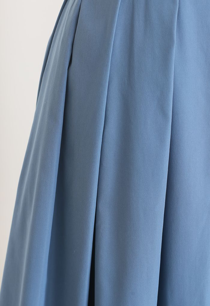 تنورة ميدي قطنية بطيات كاملة باللون الأزرق