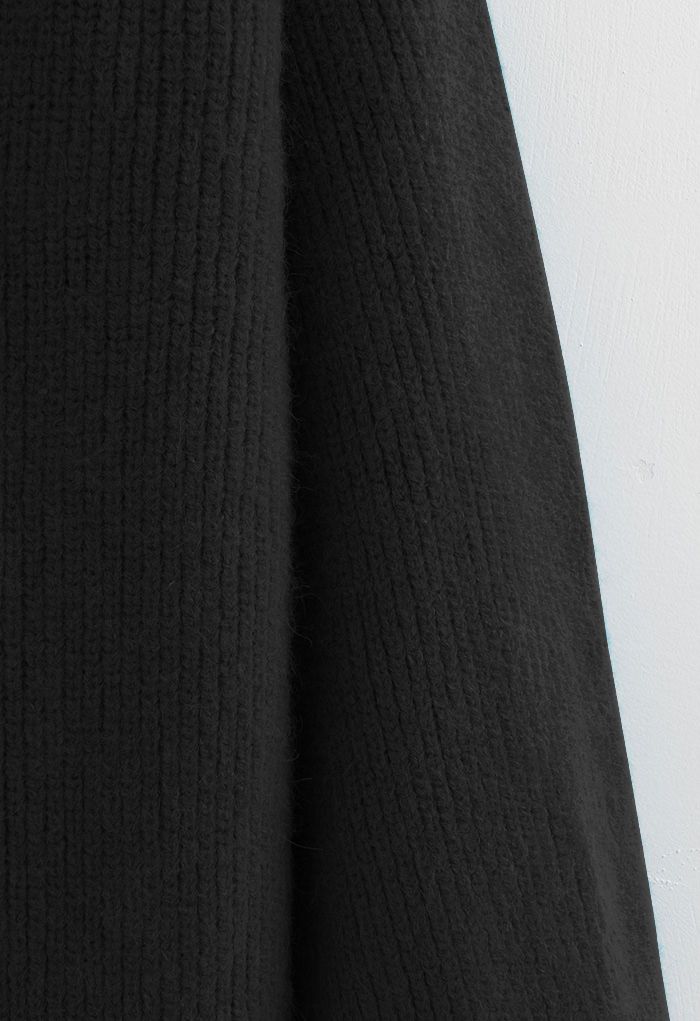 كارديجان طويل ذو ضلع مفتوح من الأمام باللون الأسود