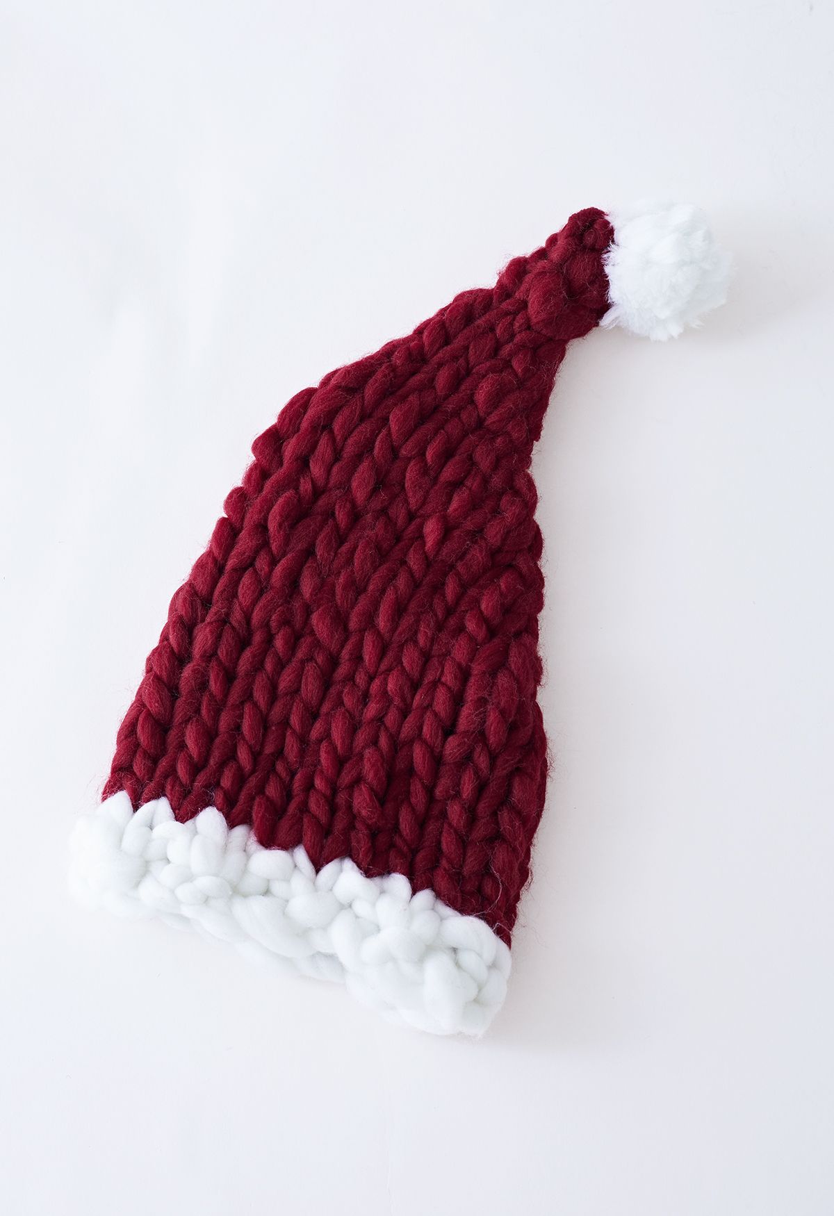 قبعة عيد الميلاد بوم بوم مضفرة يدويًا باللون العنابي