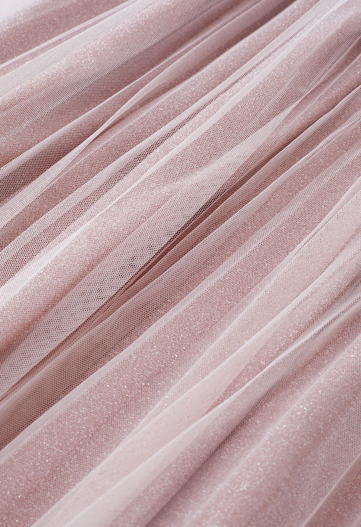 تنورة ميدي شبكية ذات ثنيات متلألئة باللون الوردي