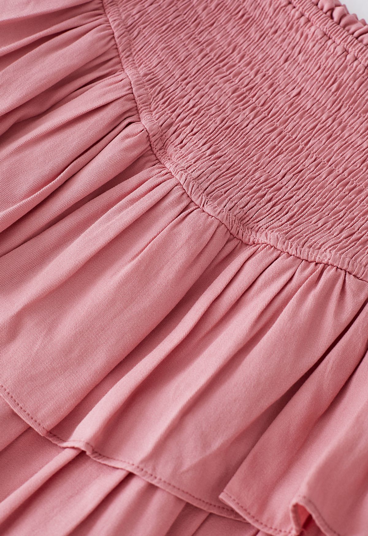 تنورة قصيرة مكشكشة متدرجة الخصر باللون الوردي