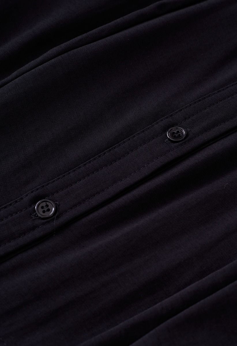 فستان قميص مكشكش بفتحة الخصر من الجانب باللون الأسود