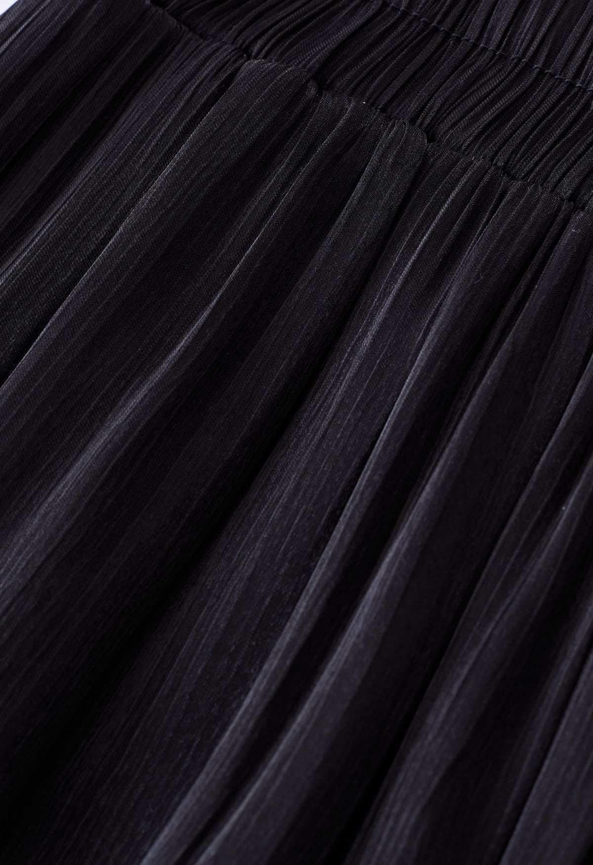 تنورة شيفون لامعة غير منتظمة باللون الأسود