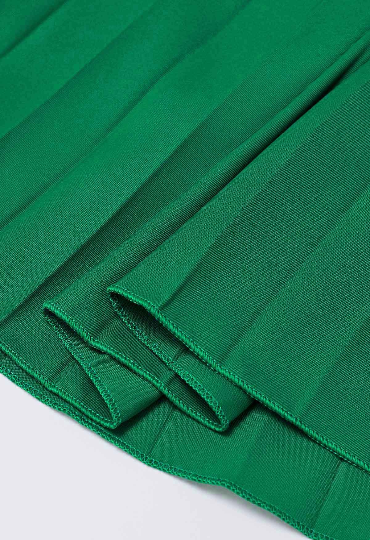 تنورة ميدي مطوي بألواح من الدانتيل باللون الأخضر