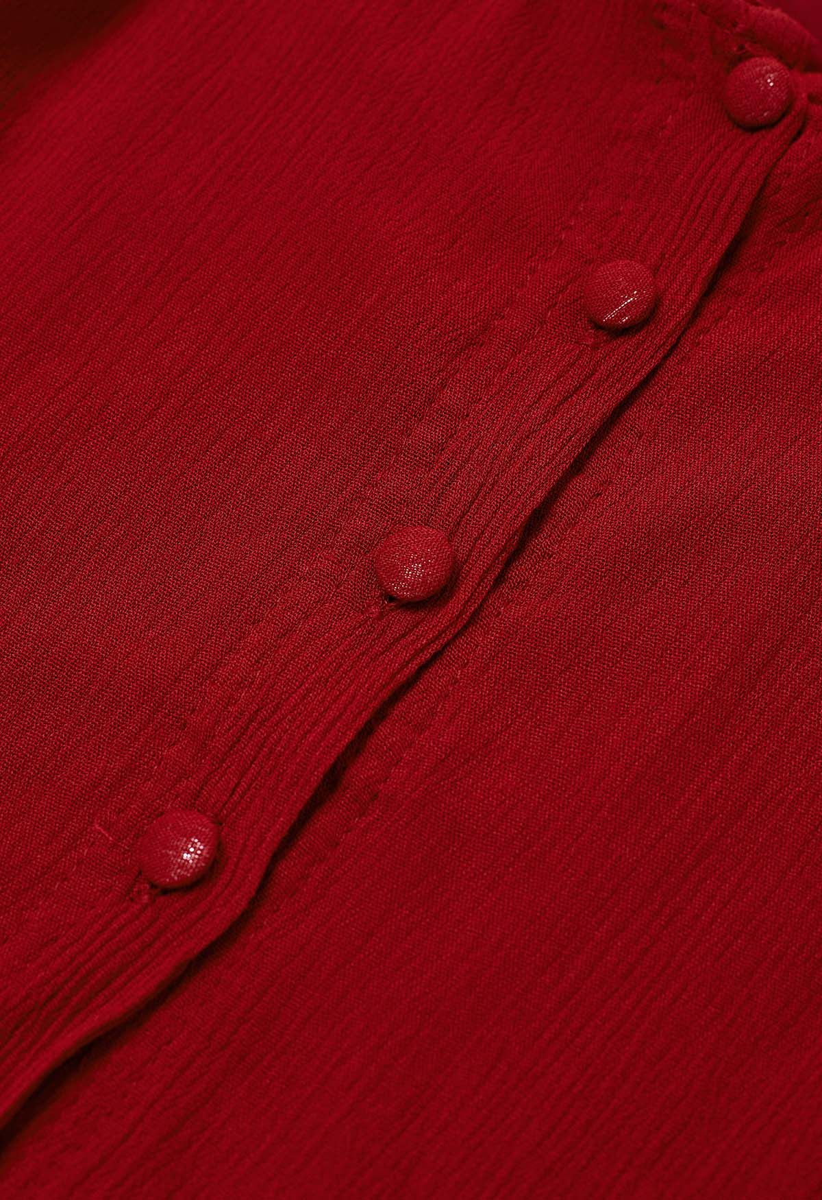فستان كشكش بحزام وأكمام فقاعية مبالغ فيها باللون الأحمر