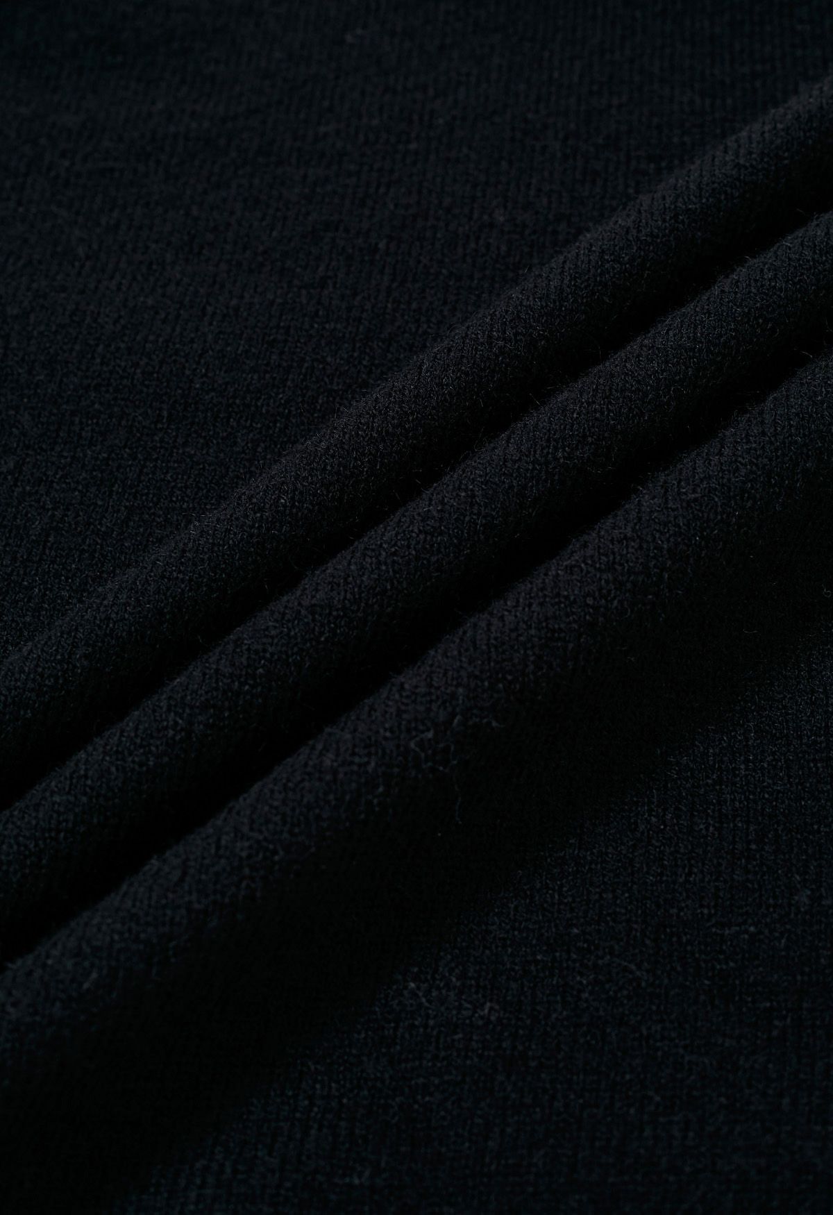 سترة متماسكة ذات أكتاف باردة على شكل BOWKNOT باللون الأسود
