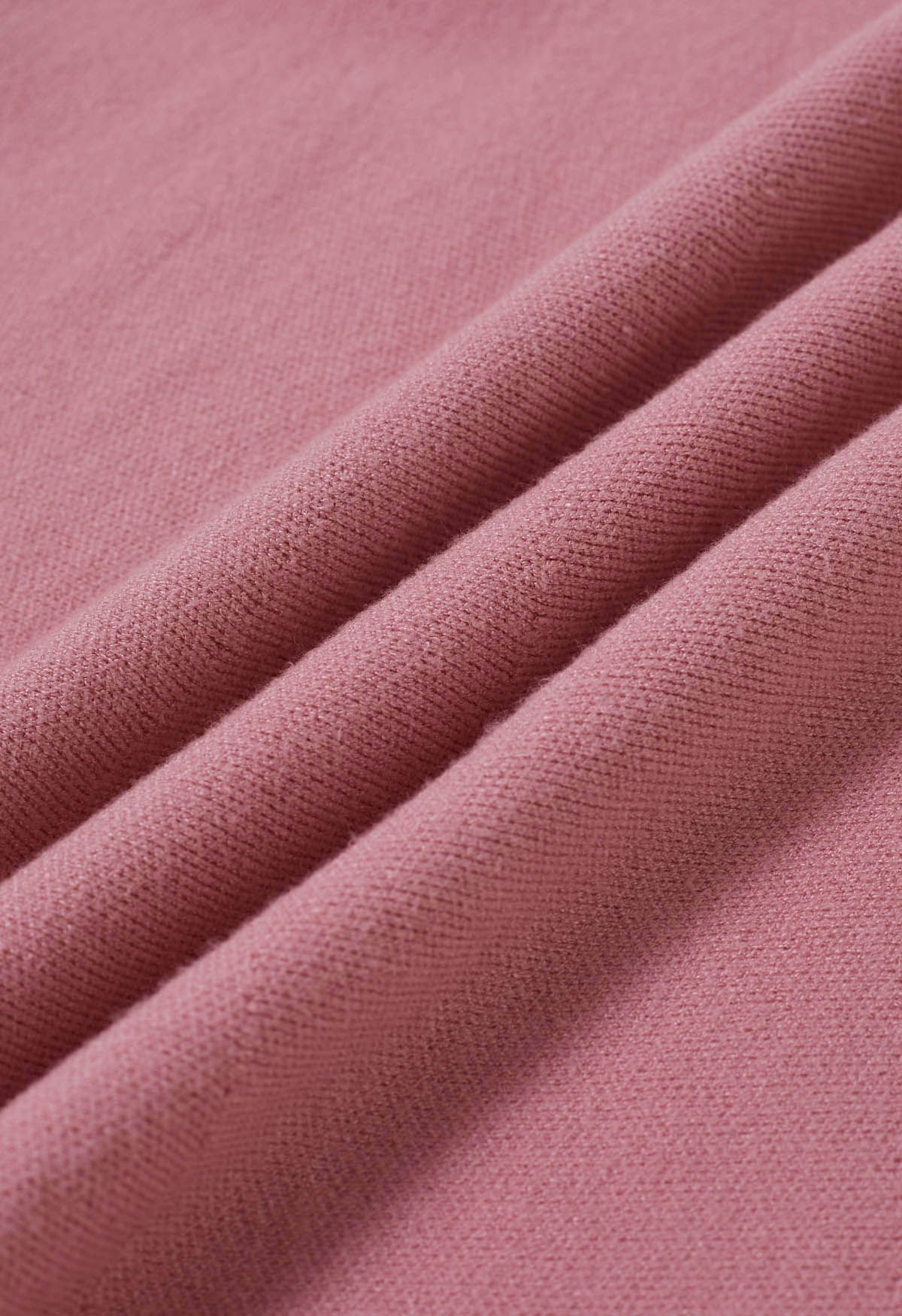 تنورة ميدي منسوجة بحاشية مكشكشة باللون الوردي