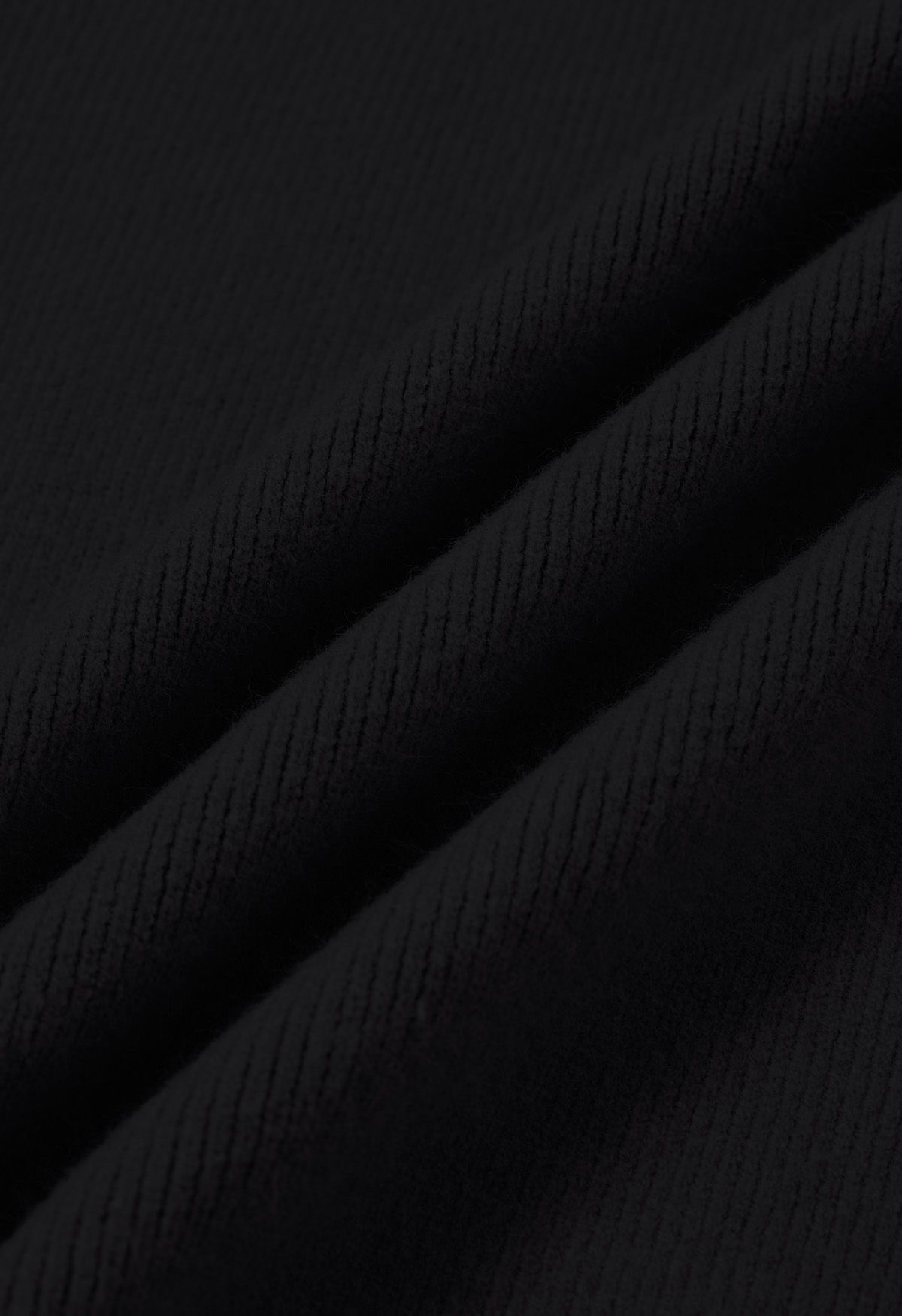 سترة صوفية كاجوال أنيقة ذات طية صدر واسعة باللون الأسود