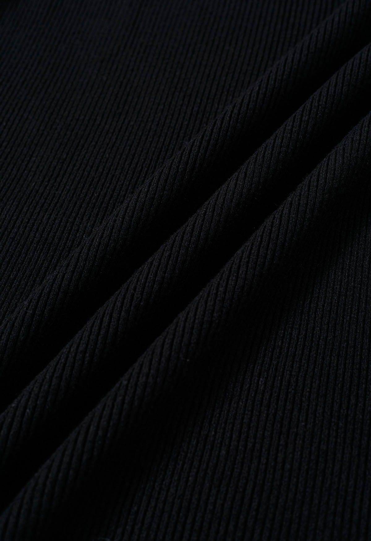 فستان منسوج مكشكش ورقبة متقاطعة وسروال باللون الأسود