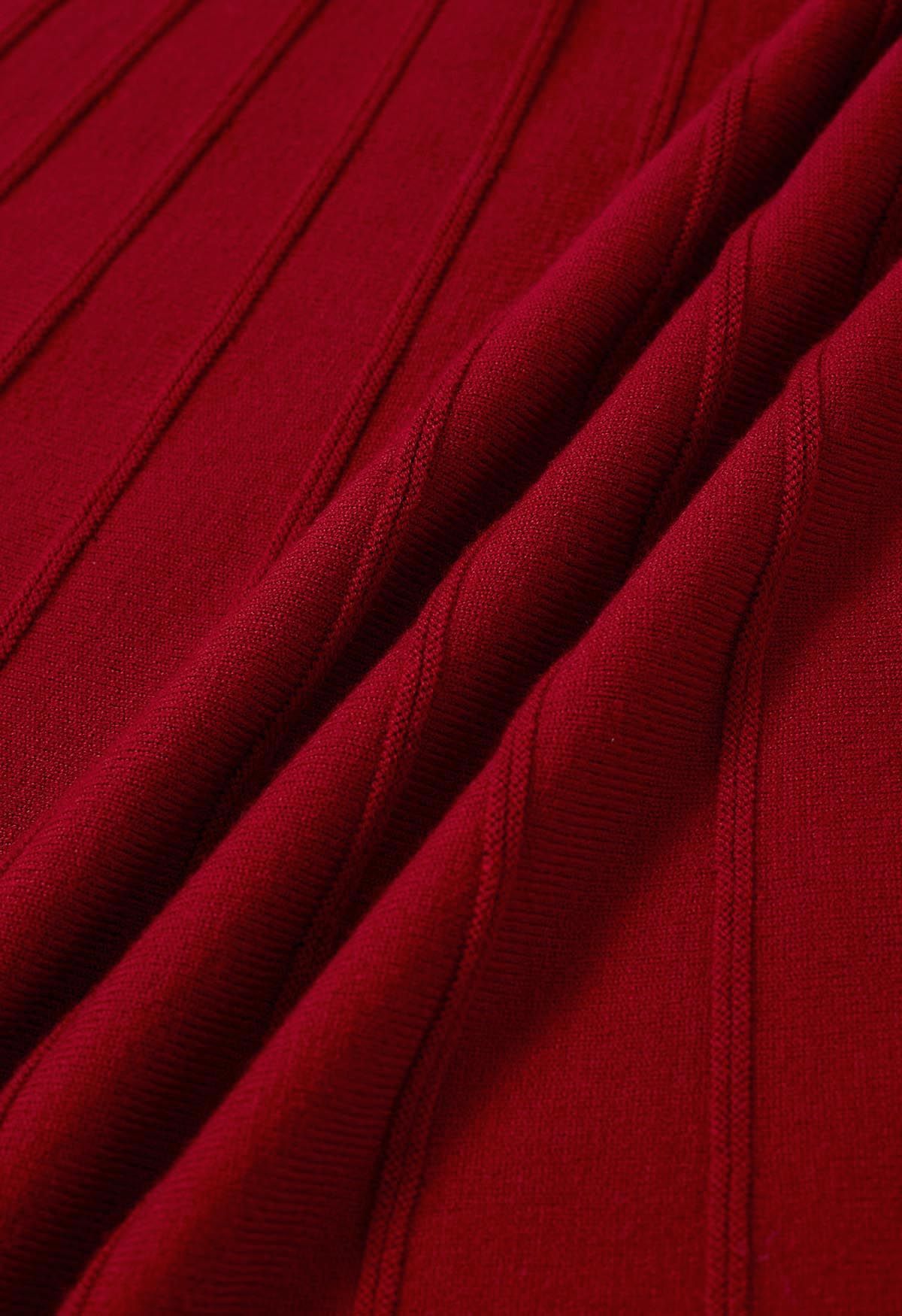 تنورة ميدي مطرزة بالخرز الفضي باللون الأحمر