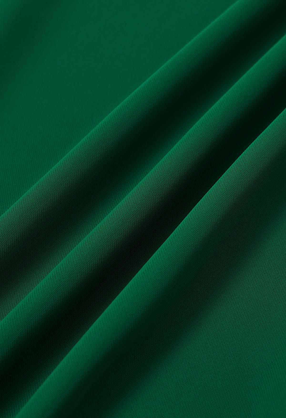 بنطال بخصر مطوي وساق مستقيمة باللون الأخضر