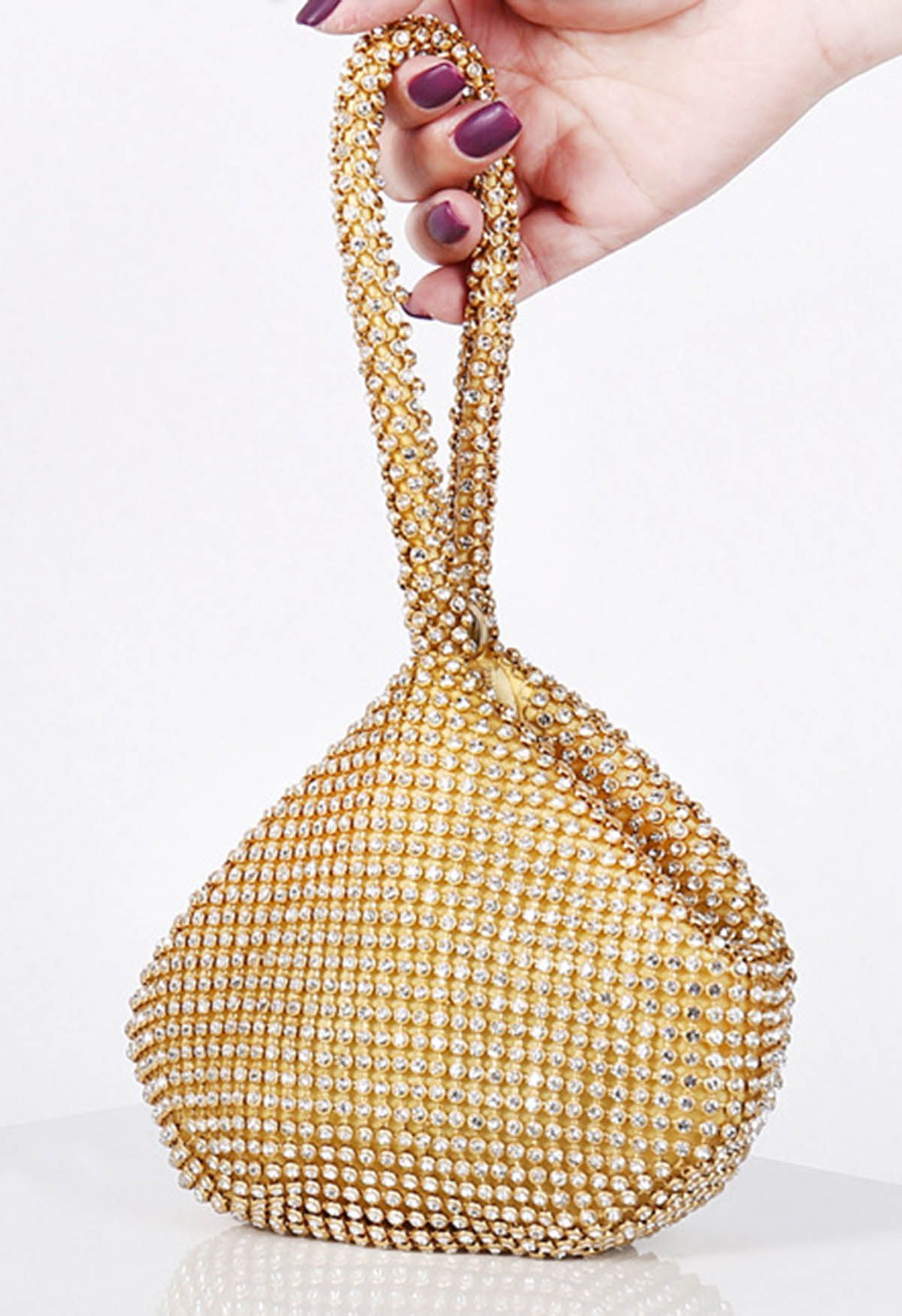 حقيبة يد صغيرة من حجر الراين بالكامل باللون الذهبي
