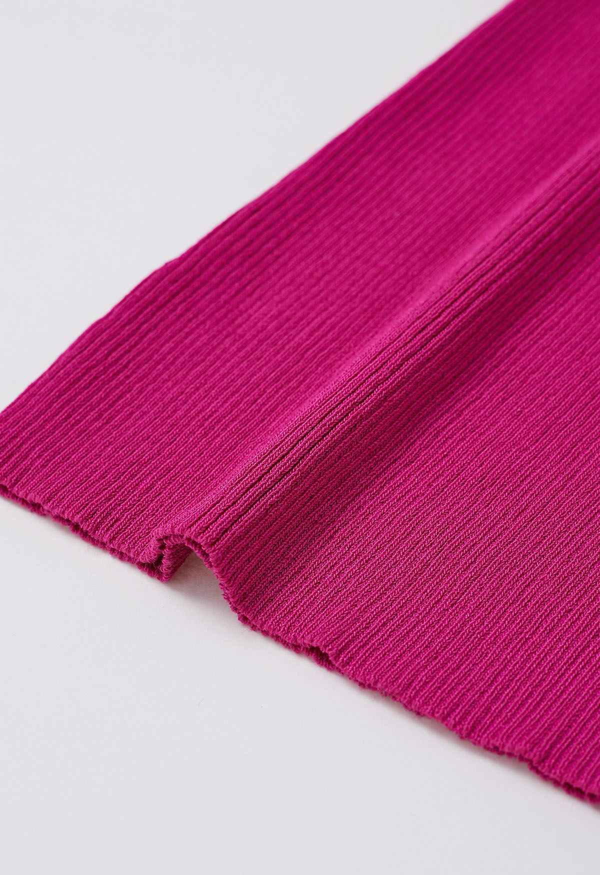 بلوزة متماسكة بأكمام شبكية ثلاثية الأبعاد باللون الوردي الفاقع