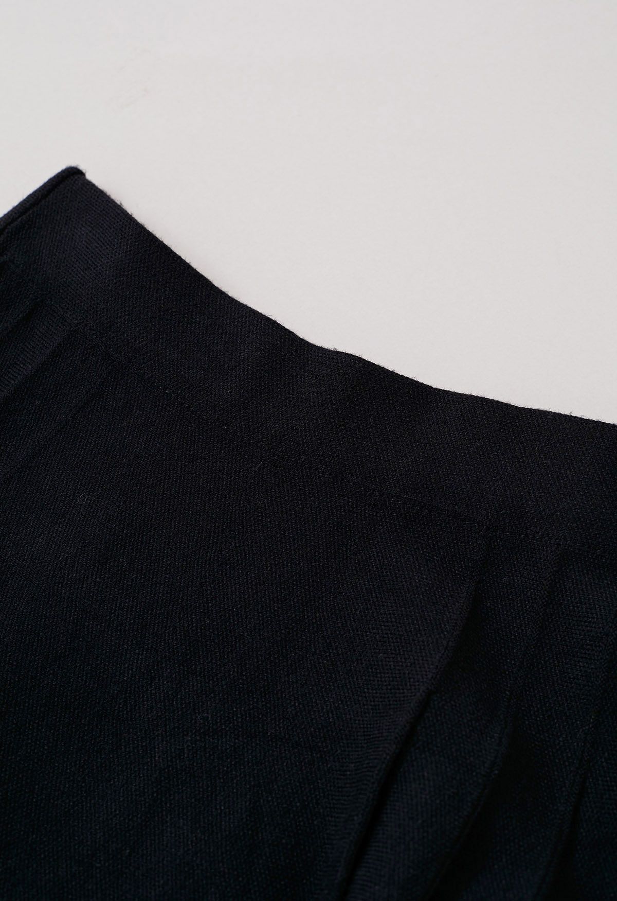 Side Pleats Knit Mini Skirt in Black