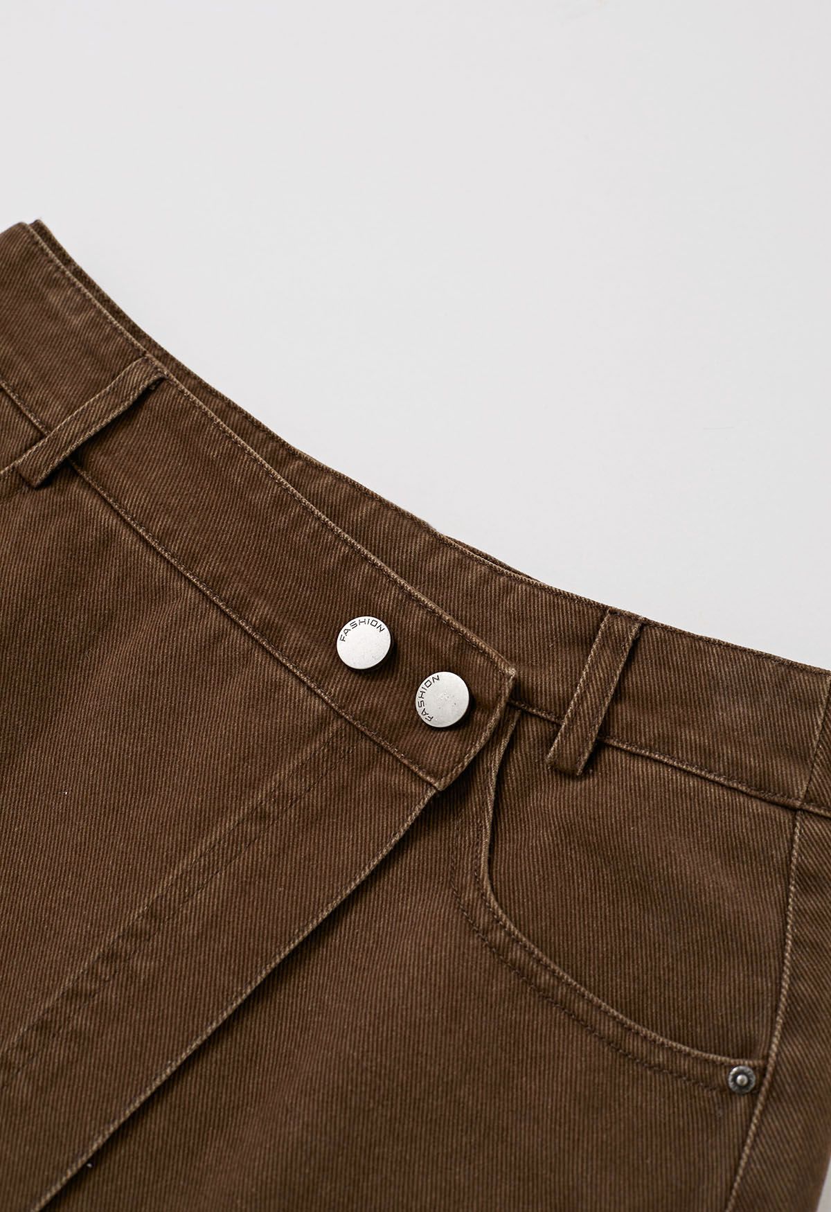 Double-Buttoned Flap Denim Mini Skirt in Brown