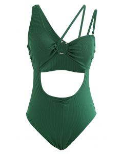 ملابس سباحة باللون الأخضر الداكن بأشرطة غير متماثلة