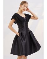 فستان كوكتيل شيفون مطوي باللون الأسود